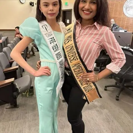 Mrs Universe America and a young titleholder at Tacoma City Council chambers